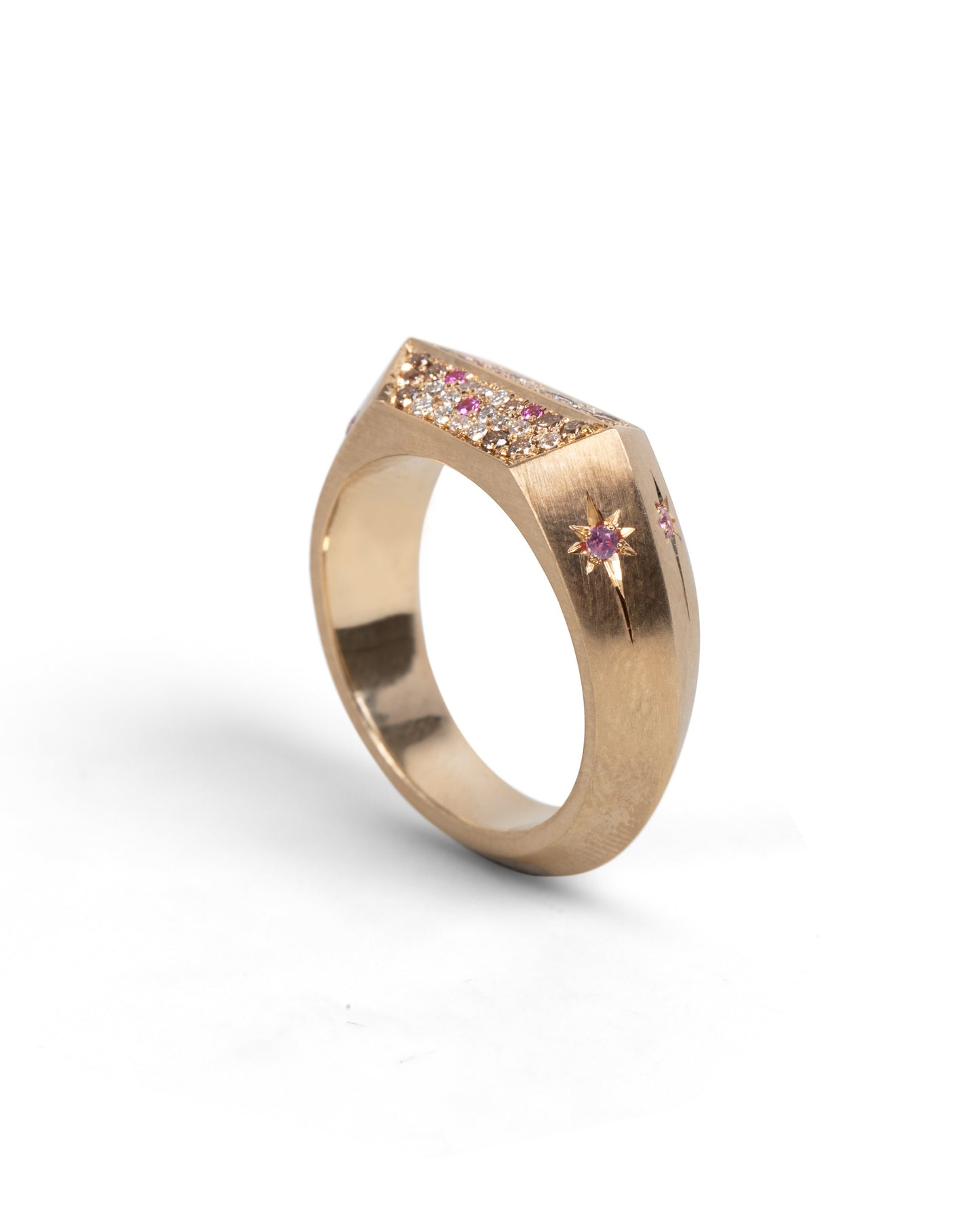 side view of angular signet ring with diamonds and pink sapphires